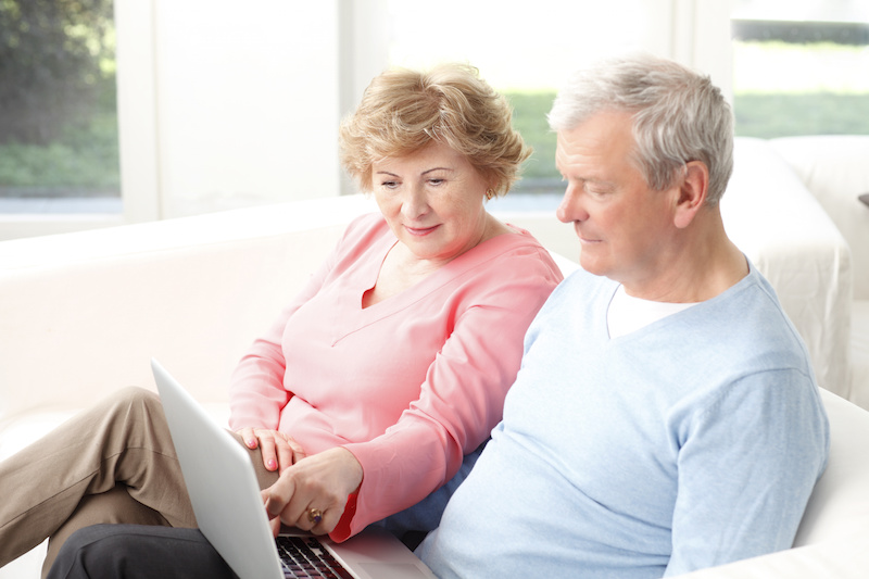 seniors on laptop